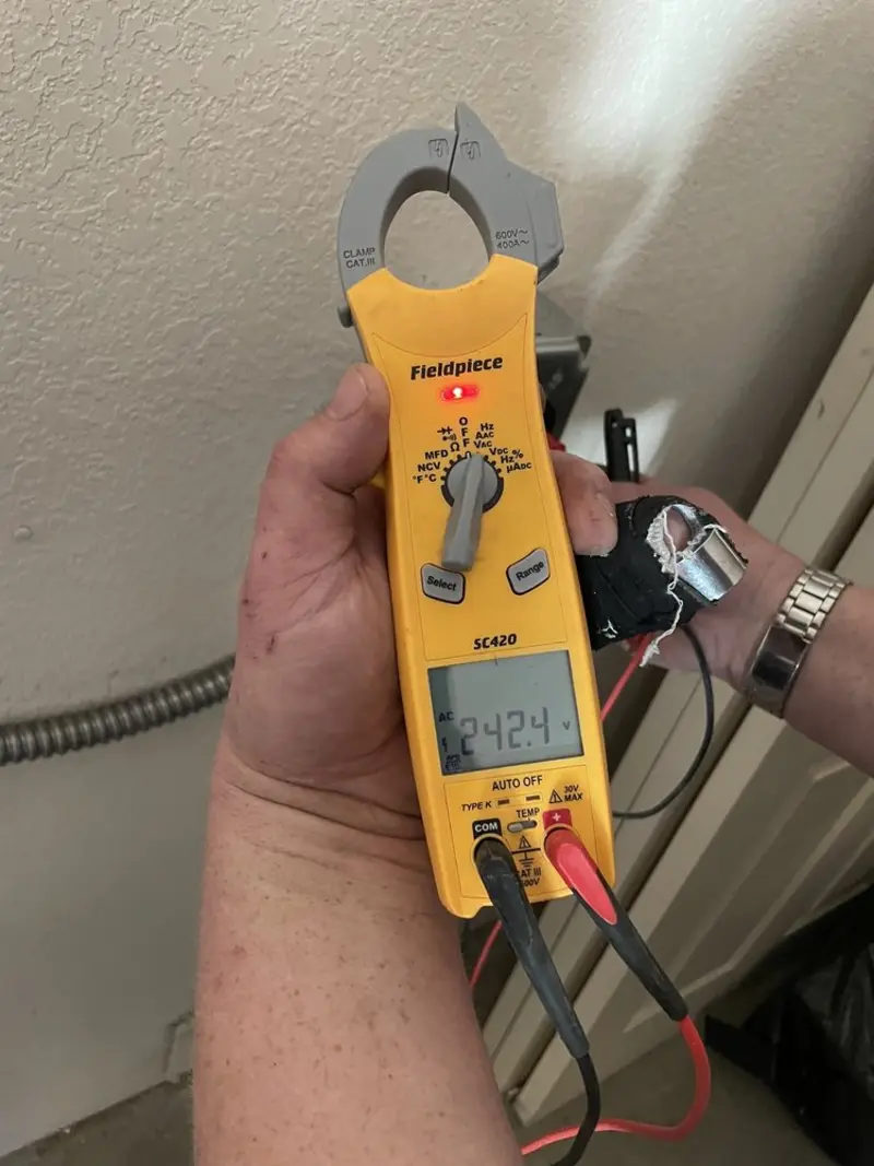 Voltage testing with clamp meter during Generator Installation in Chula Vista
